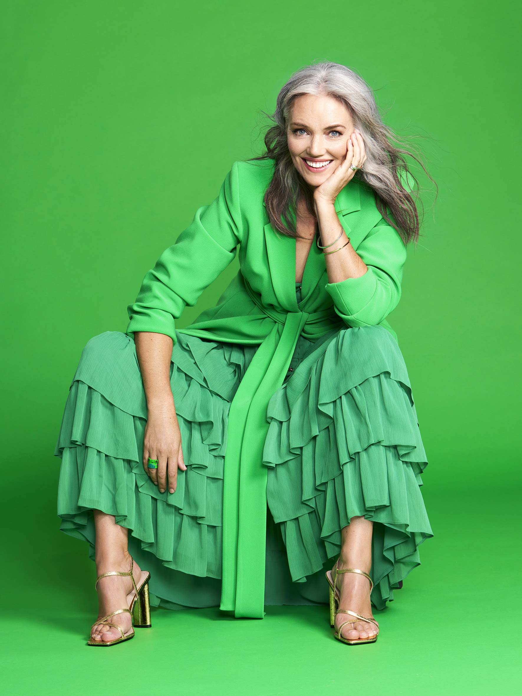 Petra Bagust grey haired woman in green dress