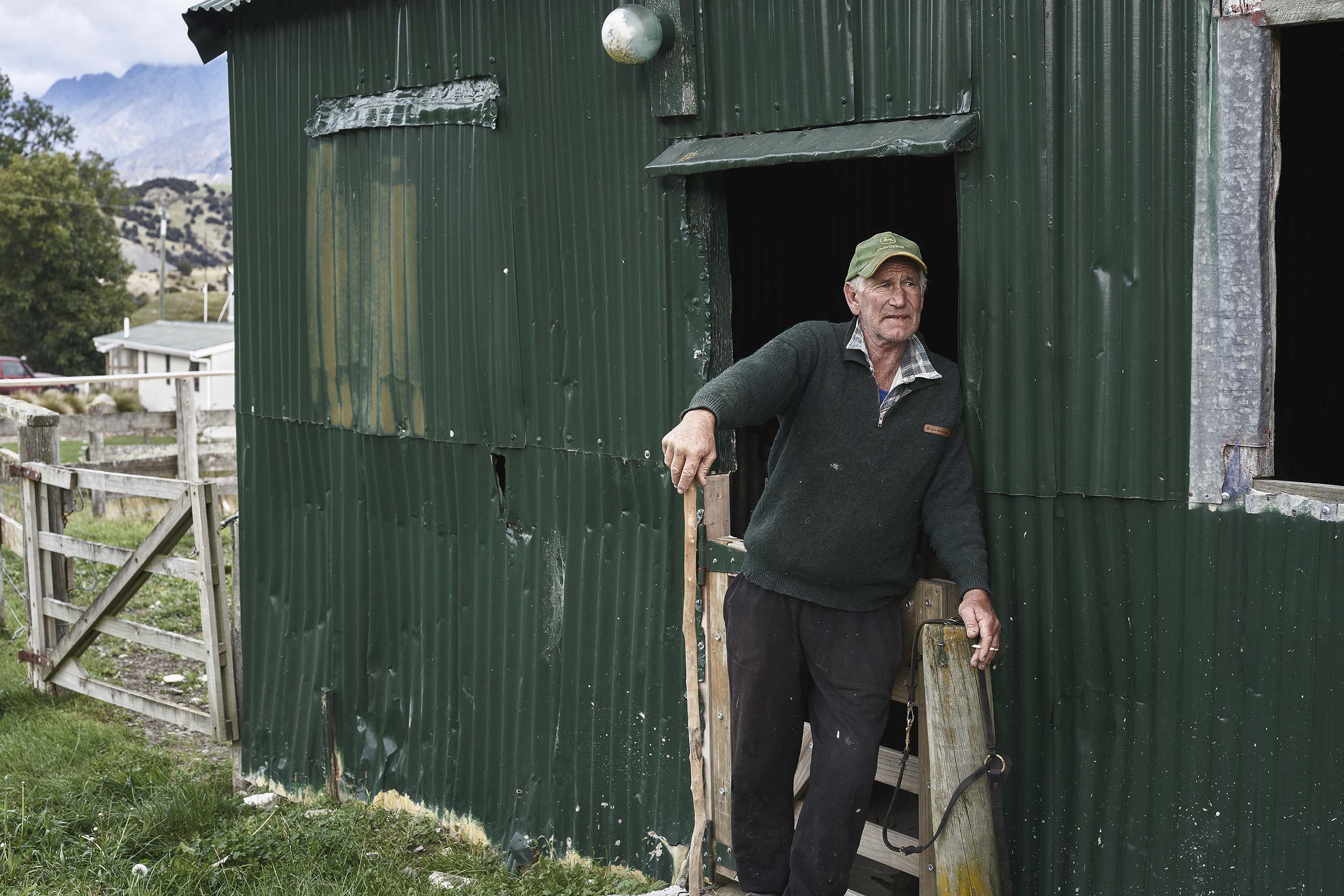 Old Farmer against shed south island farm